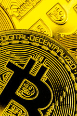 Bitcoins and New Virtual money concept.Gold bitcoins with Candle stick graph chart and digital background.Golden coin with icon letter B.Mining or blockchain technology