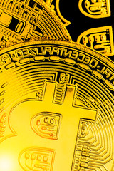 Bitcoins and New Virtual money concept.Gold bitcoins with Candle stick graph chart and digital background.Golden coin with icon letter B.Mining or blockchain technology