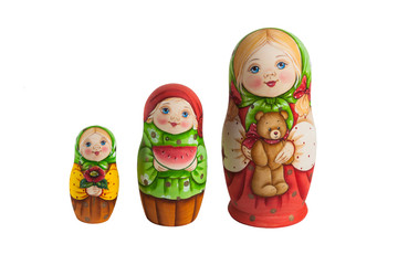 Three Russian nesting dolls on white isolated background
