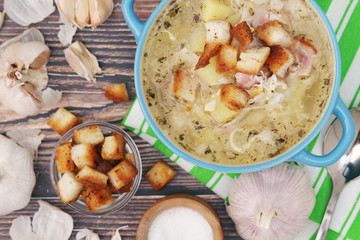A bowl with traditional Czech garlic soup cesnecka