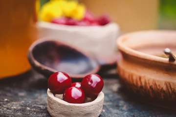 cherry and honey in cans on hemp