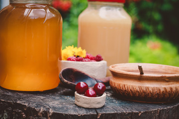 cherry and honey in cans on hemp
