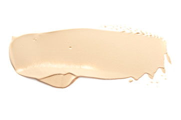Beige makeup smear of creamy foundation isolated on white background. The concept of fashion and beauty industry. - Image