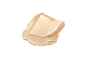 Beige makeup smear of creamy foundation isolated on white background. The concept of fashion and beauty industry. - Image