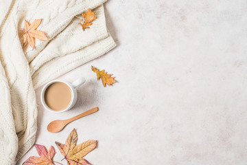 Coffee cup and sweater autumn frame