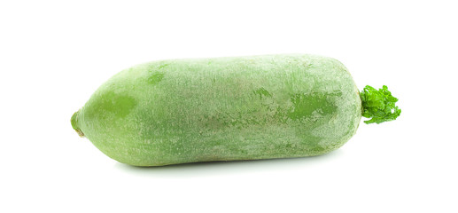 Whole single green radish on white background