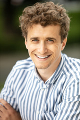 portrait of a young man outside