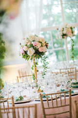 Luxury wedding table decoration. Special event table set up. Fresh flower decoration.