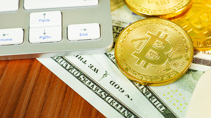 The bitcoin currency on office table for business content.