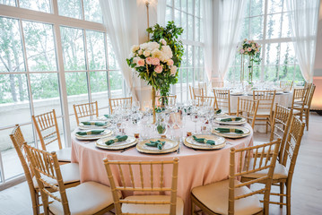 Luxury wedding table decoration. Special event table set up. Fresh flower decoration.