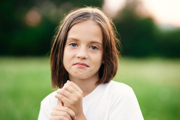 portrait of a young woman showing thumbs up