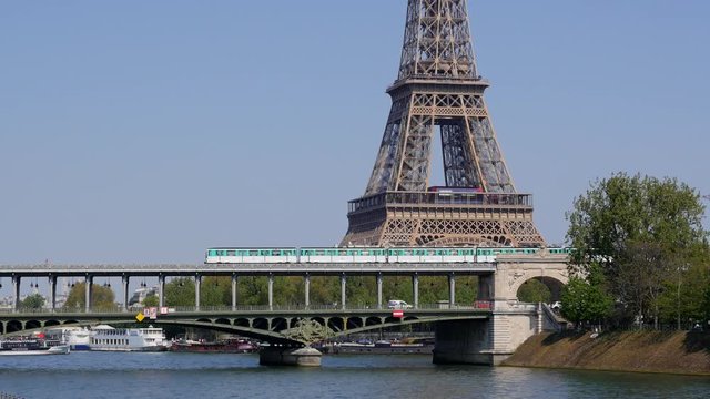 Paris metro crossing Pont de Bir-Hakeim, Eiffel Tower, Paris, France
