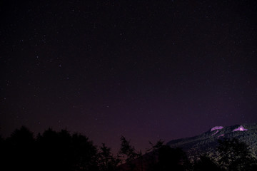 Fototapeta na wymiar night sky above Mountain