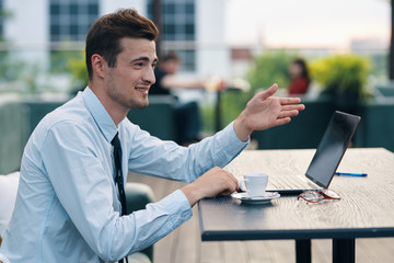 businessman working on tablet computer in office