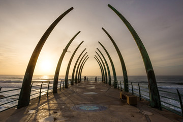 Pier structure in the morning light with view out to sea. 