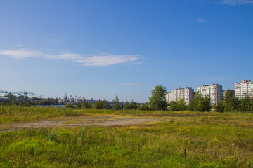 Residential building on the background of an empty field, Cherepovets