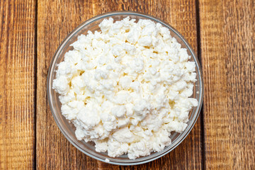 farm cottage cheese close up on wooden background protein healthy diet eco product