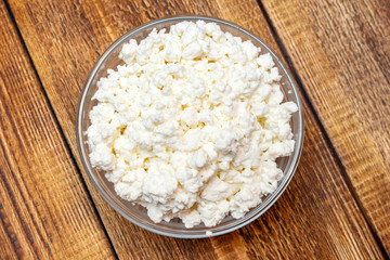 farm cottage cheese close up on wooden background protein healthy diet eco product
