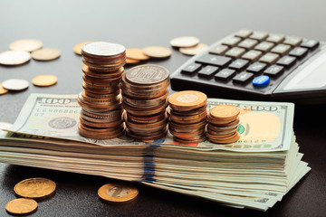 Financial business concept combination with coins, money, calculator and pen