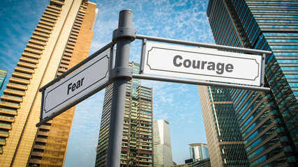 Fototapeta premium Street Sign to Courage versus Fear