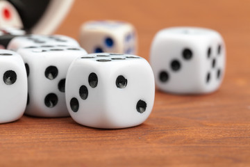 Dice on a wooden table. Concept for business risk.