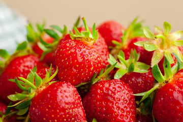 Fresh ripe red strawberries on garden's table