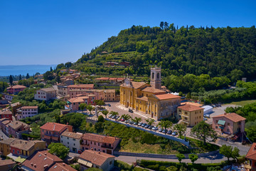 Photo with drone. Beautiful view of the city of Cavaion Veronese and its surroundings of Lake...