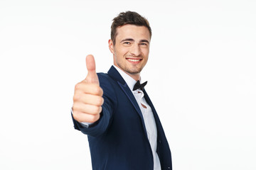 happy businessman with thumbs up