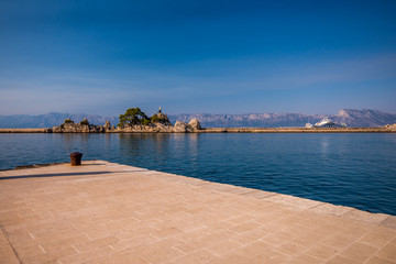 Fototapeta premium statue in port small vilage Trpanj in Dalmatia, Croatia; Peljesac peninsula