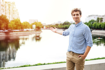 portrait of successful young man in a city