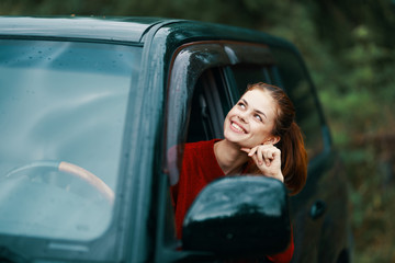 young woman in car