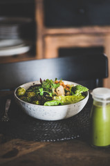 Healthy dinner or lunch setting. Vegan superbowl or Buddha bowl with hummus, vegetables, fresh...