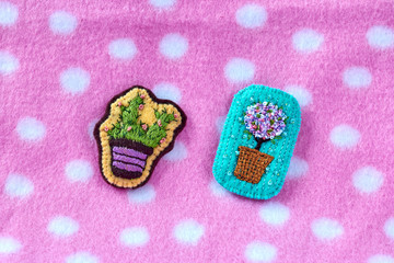 Two cactuses in pots, hand-made embroidery in the form of brooches