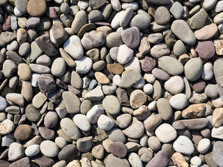 Pebbles stone texture and background. Abstract background made with stones.