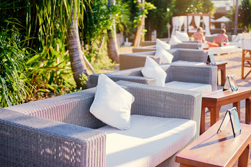 Hotel armchairs. Comfy set of chairs and other furniture in hotel.