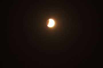 Full moon with partial eclipse
