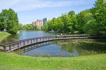 Vorontsov Park in Moscow, Russia. Wooden bridge over the Vorontsovsky pond