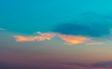 Dramatic blue and purple sky and clouds abstract background. Blue-purple clouds on sunset sky. Warm weather background. Art picture of sky at dusk. Beautiful sunset sky. Fantasizing background.