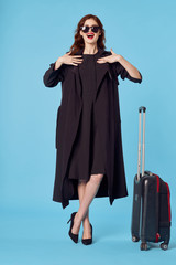 young woman with suitcase