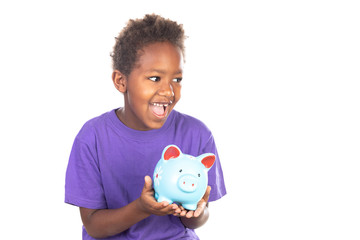 Fototapeta na wymiar Funny african Child with a piggybank