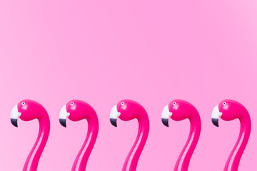 Pink pen Flamingo on a pink background. Copy space Flat lay.
