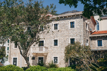 Fototapeta na wymiar View of a typical apartment building in Petrovac in Montenegro.