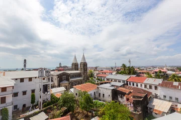 Deurstickers rooftop view over stone town zanzibar looking at corrugated iron roof sheeting © mikefoto58