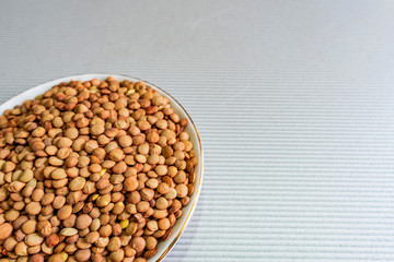 Bowl full of lentils with copy space