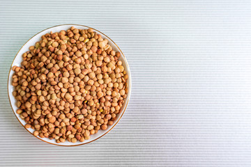 Bowl full of lentils with copy space