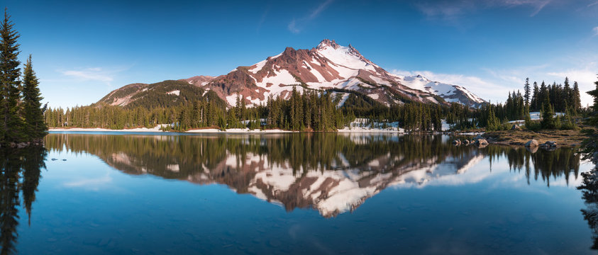 At 10,492 feet high, Mt Jefferson is Oregon's second tallest mountain.Mount Jefferson Wilderness Area, Oregon The snow covered central Oregon Cascade volcano Mount Jefferson rises above a pine forest