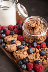 Close up photo of delicious chocolate oatmeal cookies with bluebarries