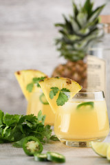 Tequila with pineapple and jalapeno