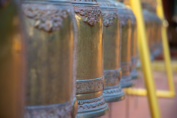 Bronze bells perspective view in a temple in Bangkok