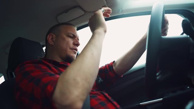 Aggressive Man Pushes Center Of Steering Wheel .